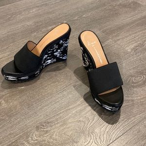 Black wedge slip on